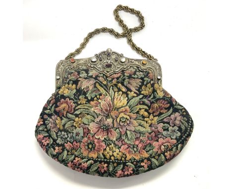 An ornate vintage .800 silver mounted evening bag inset with varied semi precious stones including Garnet, Agate, Mother of P