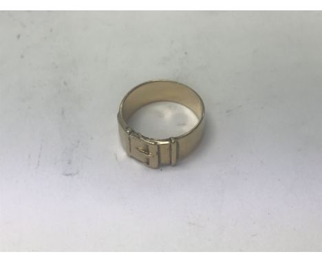 A 9ct gold buckle ring. Approx 6.5 grams size R.