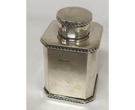 An Edwardian silver tea caddy of square shape with canted corners detachable lid. Chester hallmarks 1901 weight 216g height 1