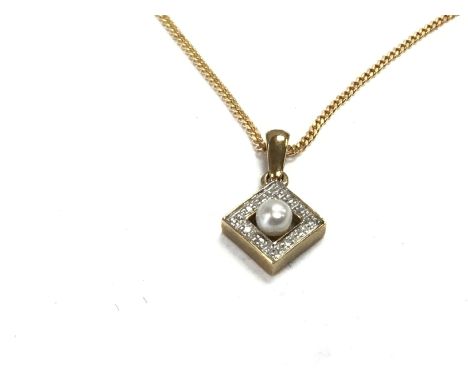 A 9ct gold chain with a pearl and diamond pendant. Total weight 4g