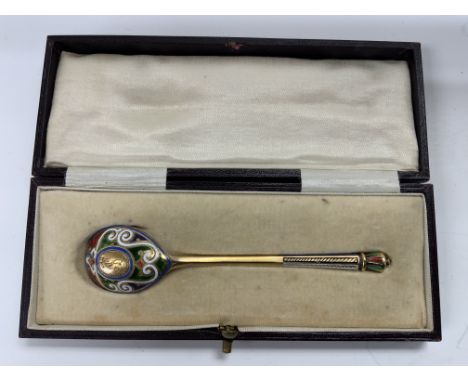 A Russian silver gilt and enamel cased spoons, with marks for Viktor Vasilyevich Savinsky, Moscow 1874. (B)
