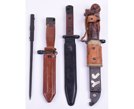 Danish Madsen 1947 Rifle Bayonet, with two piece wooden grips, housed in its original scabbard. Doubled edged blade measuring