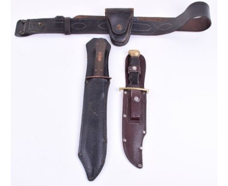 Two Modern Bowie Type Knives, being a large example with CROCODILE HUNTER etched to the blade, wooden grip with brass pommel 