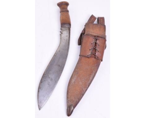 Great War 1915 Dated Gurkha Kukri, with wooden grip having central screw to the top section. Curved single edged blade with s