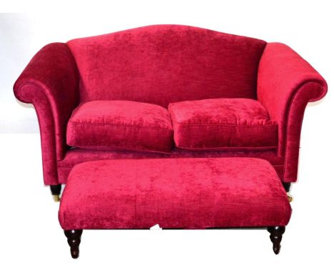 A Two Seater Sofa, of recent date, upholstered in red velvet with two squab cushions, raised on stained mahogany legs with br