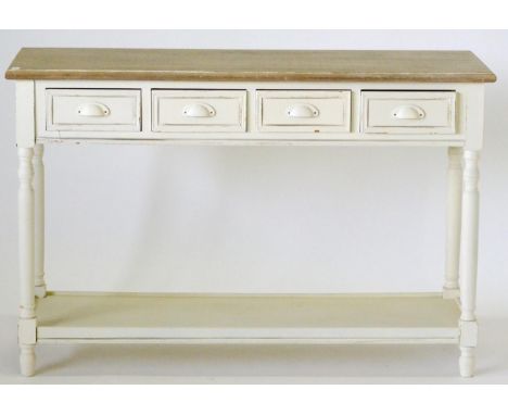 A Cream Painted Shabby-Chic Hall Table, of recent date, fitted with four drawers above spindle turned legs joined by a shelf,