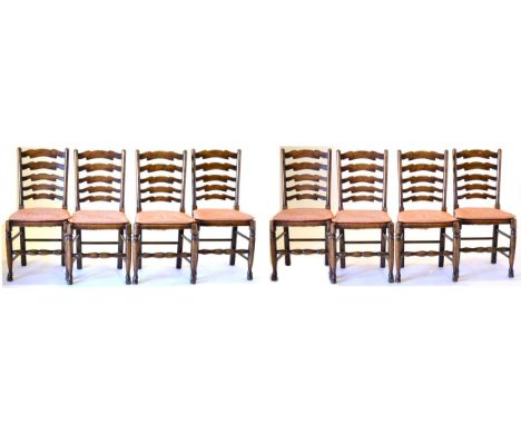 A Set of Eight Reproduction Oak Lancashire Style Ladder Back and Rush Seated Chairs, 47cm by 39cm by 96cm