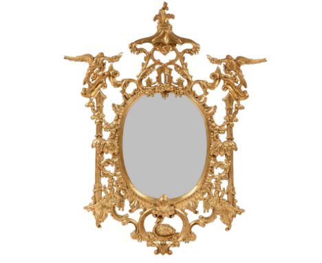 A Pair of Reproduction Chinese Chippendale Gilt Mirrors, the oval plates with pagoda tops and flanked by griffins, 156cm by 1
