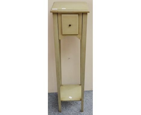 A Green Painted Plant Stand, of recent date, with a deep drawer and raised on square form legs joined by a shelf, 29.5cm by 2