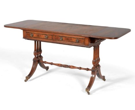 A Reproduction Mahogany and Crossbanded Sofa Table, with two rounded drop leaves and reeded edge above two frieze drawers, ra