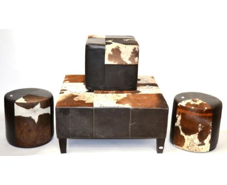 A Reproduction Faux Leather and Brown Hide Coffee Table, of recent date, the top made up of nine stitched segments, raised on