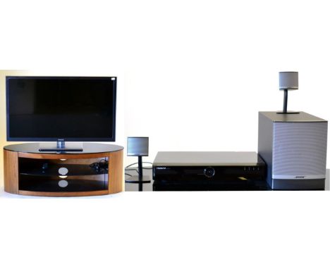 A Panasonic Viera Flatscreen Television, model no.TX-L42ET5B, with remote control; A Buckingham Walnut Effect Glass Top Oval 