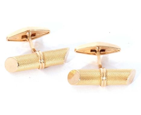 Pair of 750 stamped cuff links, a cylindrical angula design with engine turned decoration, having swivel fittings, g/w 11.6gm