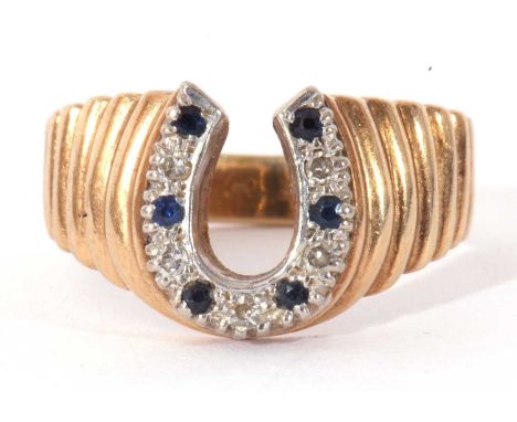 9ct gold diamond and sapphire horseshoe ring, the horseshoe alternate set with small diamonds and small sapphires, raised bet