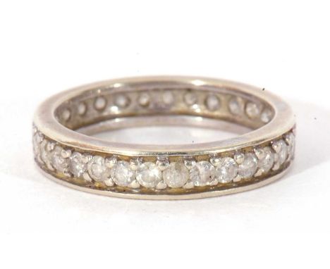 Precious metal and diamond eternity ring, a full band of small single cut diamonds, size K/L