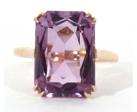 9ct gold and amethyst ring, the rectangular cut faceted amethyst, 15 x 10mm, raised in a basket mount, size K/L