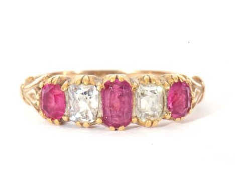 Ruby and diamond five stone ring alternate set with three graduated oval cut rubies and two old cut diamonds, diamond ct wt 0