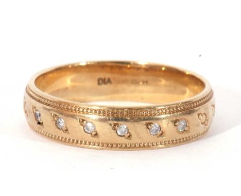 Modern 9ct gold and small diamond band, the top section set with six small single cut diamonds and further engraved with geom