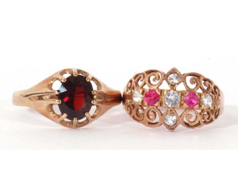 Mixed Lot: 9ct gold and garnet single stone ring, the oval faceted garnet multi-claw set and raised between tapering pierced 