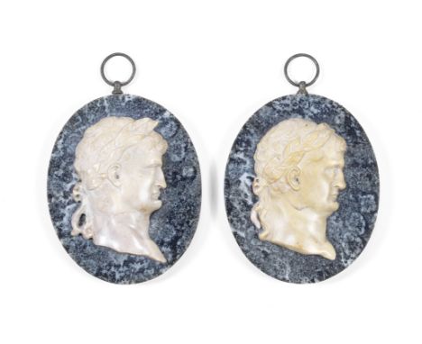 A pair of 19th century Italian 'Grand Tour' Giallo Antico marble portrait reliefs of Roman emperorsone depicting Nero in prof