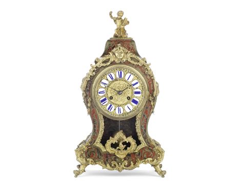 A late 19th century gilt brass mounted 'Boulle' marquetry inlaid mantel clockthe movement signed Rollin A Paristhe waisted ca