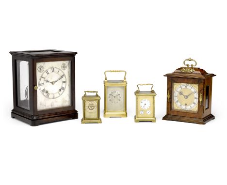 A collection of five various early 20th century clockscomprising a gilt brass hour and half hour striking corniche carriage c