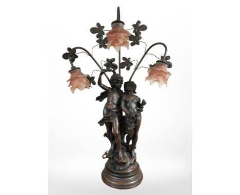 An Art Nouveau-style figural table lamp, height 84cm.