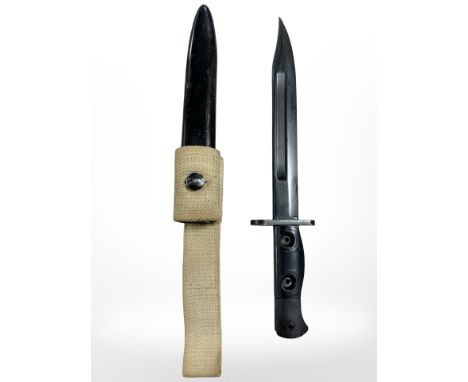A British Military bayonet L1A3 knife bayonet with scabbard, 20cm Bowie blade stamped '67 Enfield', with webbing frog