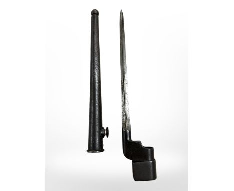 A British Military bayonet No 4 Mk I cruciform blade spike bayonet with scabbard, pommel stamped 'No 4 Mk 1 S.M', blade 20cm 