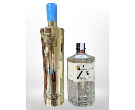 One bottle of Roku gin 700ml, together with a bottle of Au blue raspberry flavoured vodka 70cl. (2) 