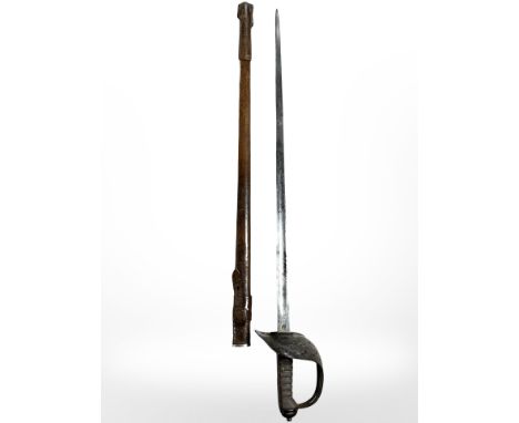 A British 1897 pattern Infantry Officer's sword, with 82cm etched blade, hilt with Queen Victoria cypher, and in leather scab