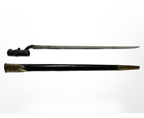 A British Pattern 1853 socket bayonet with brass-mounted WD stamped leather scabbard, blade 43cm long