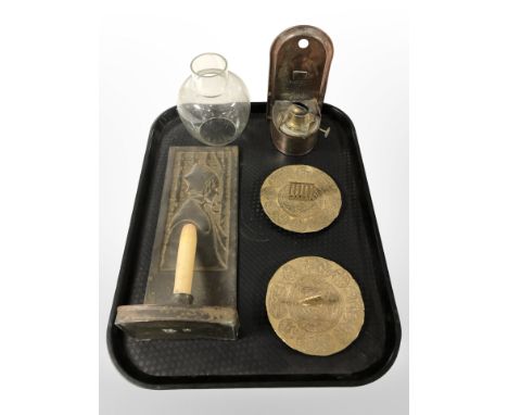 An Arts and Crafts candle wall sconce decorated with a Dutch lady, together with a copper wall oil lamp and two Middle Easter