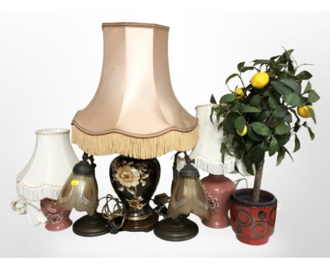 Two pairs of table lamps, a further ceramic lamp with tasseled shade and an artificial plant in pot, tallest 73cm. 