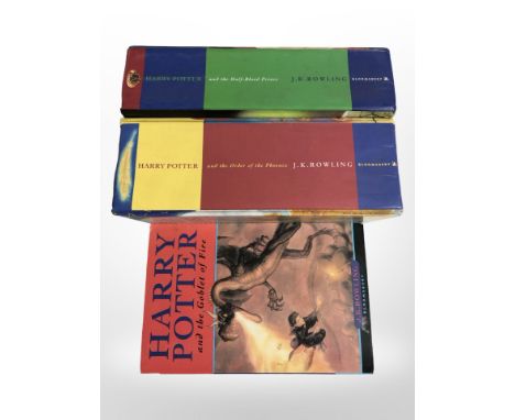 Three first edition Harry Potter books: The Goblet of Fire, The Order of the Phoenix, and The Half-Blood Prince.