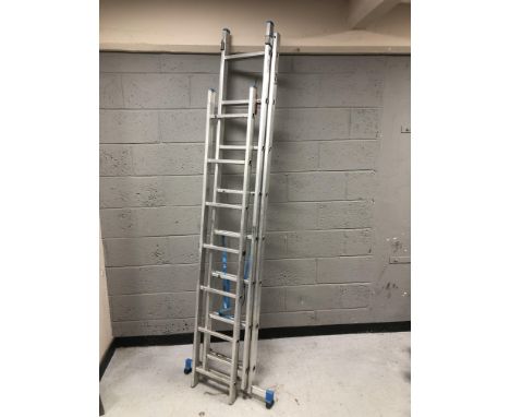An aluminium extension ladder, and a further single ladder. 