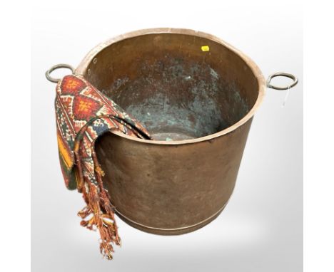 A 19th century twin-handled copper log bin, height 43 cm and an embroidered pelmet 