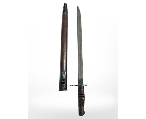 A British Pattern 1913 sword bayonet with steel-mounted leather scabbard, blade stamped '1913' and date stamped for June 1917