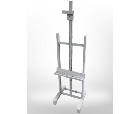 A painted easel, height 176cm