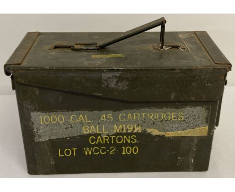 A British .45 khaki green ammunition carry tin. Yellow painted information to side 1000 Cal. .45 Cartridges Ball M1911 Carton