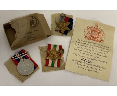 WWII medal trio awarded to J. R. Ellis with original issue box and certificate of issue. Comprising: 1939-1945 War medal, 193