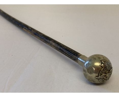 A vintage RAF swagger stick mounted with silver plate top with RAF wings.  Approx. 89cm long.