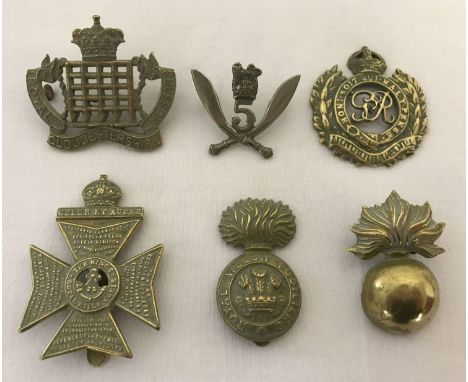 6 assorted British Army cap badges with slider and lug fixings. One is marked "copy" to reverse, one has slider missing. 
