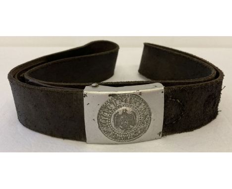 A WWII style German 3rd Reich Heer (army) parade leather belt and buckle. Buckle shows "Gott Mit Uns" lettering above a Germa