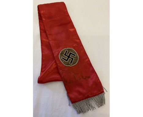 A German WWII style red satin sash with bullion detail and tassels.  Approx. 173cm long (to inc. tassles).