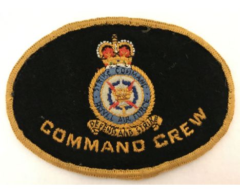 A British Queen's Crown - post 1953, Bomber Command crew badge. Oval shaped embroidered cloth patch. Approx. 8cm x 11cm.