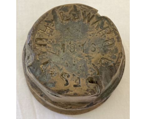 A WWI style British army brass wagon wheel hub. Makers marks, arrow mark and date all stamped into top. Approx. 6.5cm tall x 