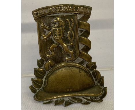 A WWII Czech army in England brass pin back badge. These were worn when in civilian clothes to show they were serving soldier