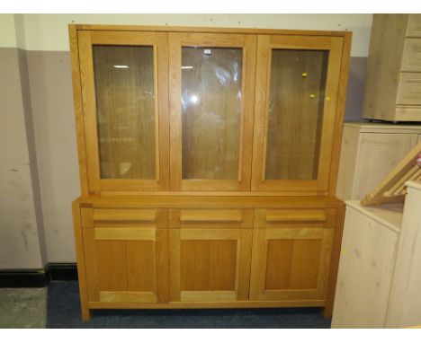 AN M &amp; S SONOMA COLLECTION LIGHT OAK WALL UNIT, GLAZED 3 DOOR UNIT ABOVE A COMBINATION OF DRAWERS AND CUPBOARDS W-179 H-1