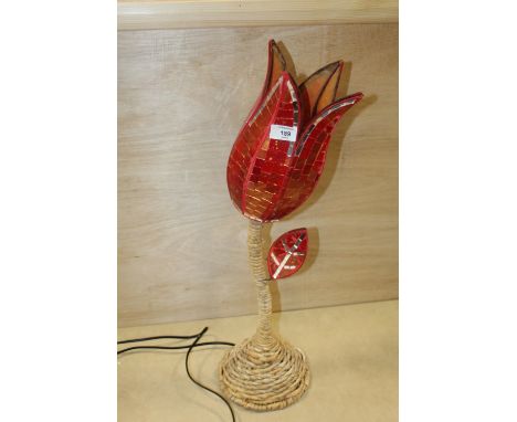 A MODERN FLORAL TABLE LAMP